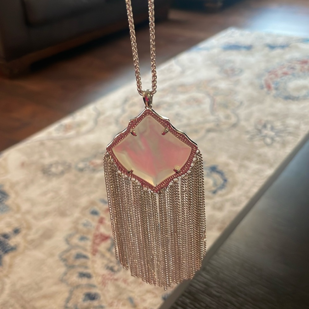 This is a silver adjustable Kendra Scott necklace in silver. Never worn.